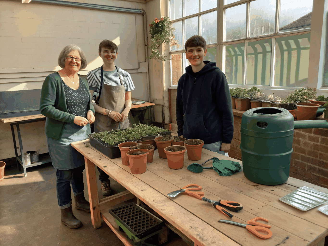 Workshop instructor teaching organic gardening techniques, 2022.